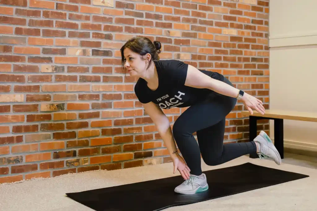 Tone Your Arms in Just One Week: Achieve Results Without the Gym! 1 A person exercising their arms at home with light weights Paisley