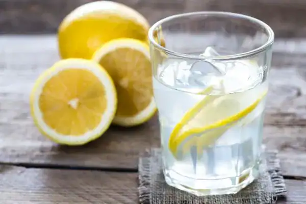 Hydration: The Secret Ingredient for a Toned Stomach and Enhanced Fitness 2 Image of lemon water to aid hydration Paisley