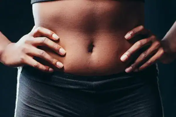 Toning Your Stomach: The Ultimate Guide to Achieving a Sculpted Stomach While Shedding Pounds 1 Image of a toned stomach after non surgical treatment Paisley