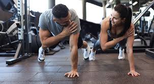 Sculpting Sleek Arms: The Essential Role of Cardio in Toning Without Bulking Up 1 Image of man and woman doing Cardio Paisley to tone their arms.